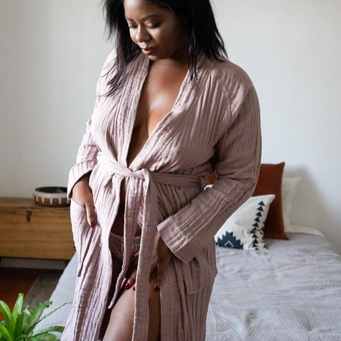 This featherweight gauzy woven robe is perfect to cozy up in all year round